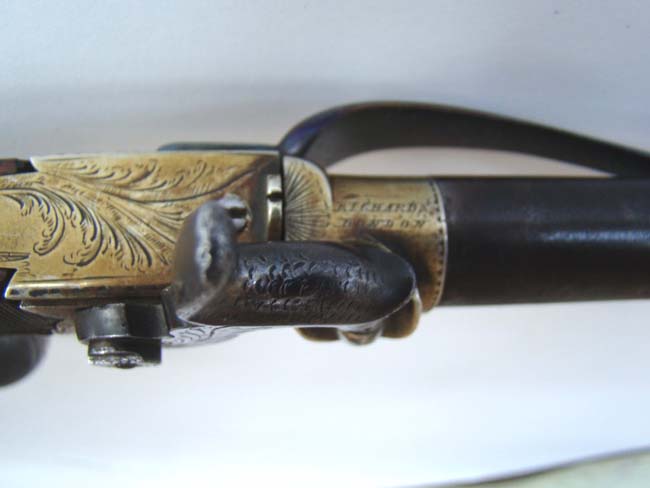 An English percussion 'boot' pistol by William Westley Richards, Gunmaker to Prince Albert, circa 1840-1850. — image 7